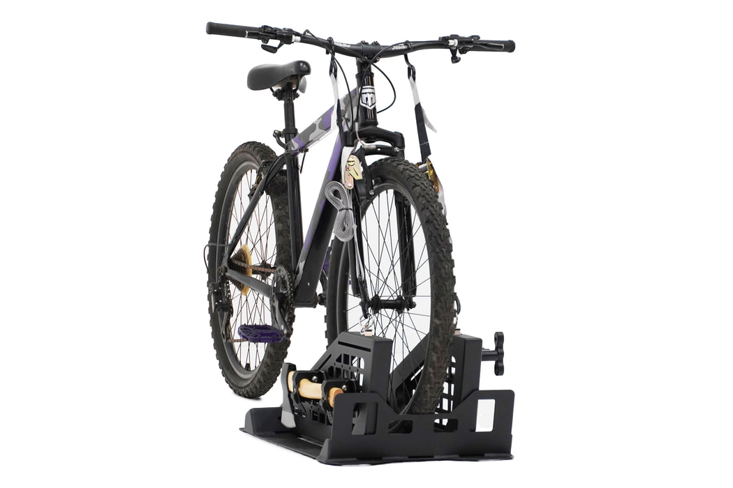 Bike mounted on the Universal Truck Bed Tire Carrier & Accessory Mount