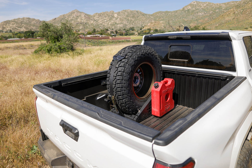 Rotopax on the Universal Truck Bed Tire Carrier & Accessory Mount