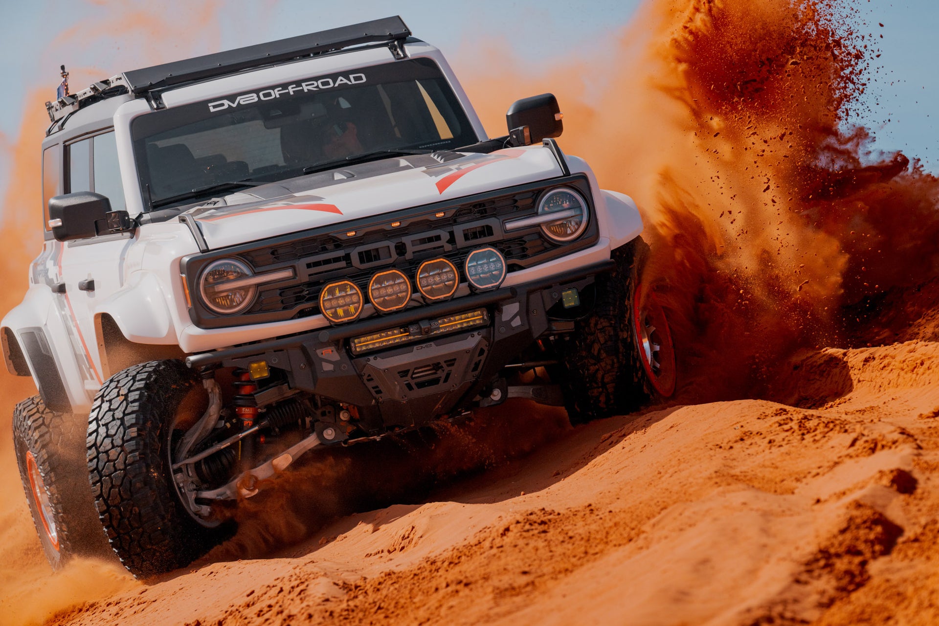 Ford Bronco Raptor with Tube Front Bumper driving in Sand Dunes