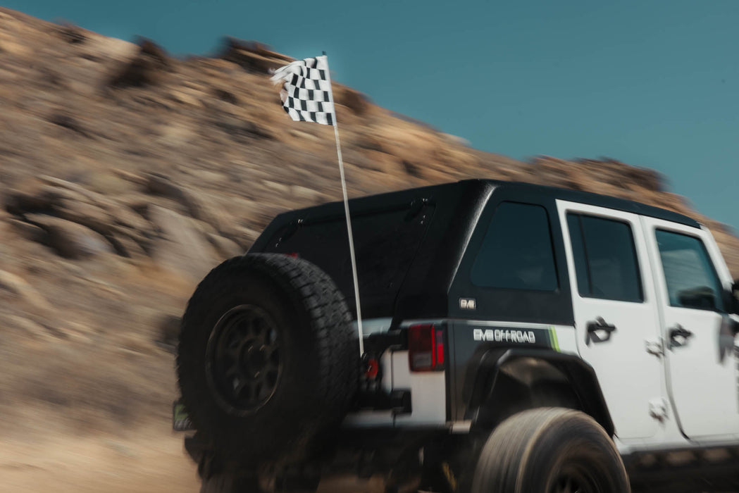 Race flag holding strong at high speed with Universal Molle Adjustable Antenna & Whip Mount installed
