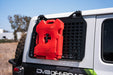 Universal Molle Panel Rotopax Mount installed with fuel jug