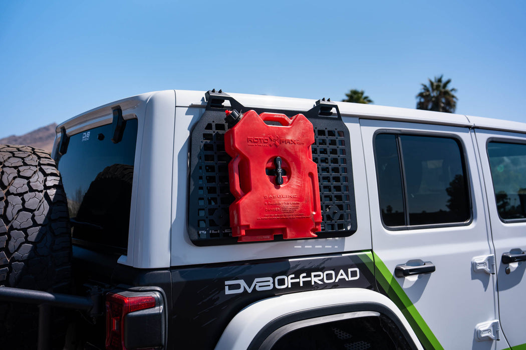 Jeep prepared to travel with Rotopax fuel jug mounted to molle panel with DV8 Universal Molle Panel Rotopax Mount