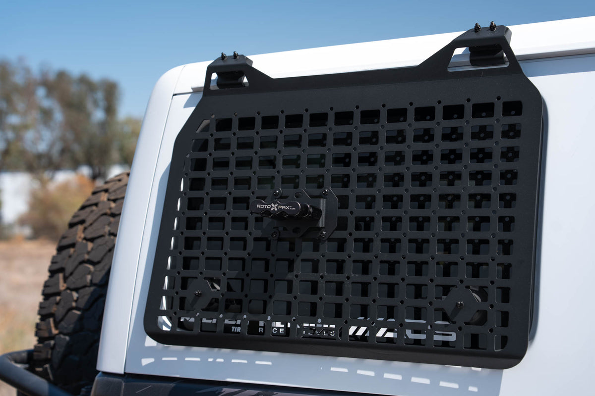 Universal Molle Panel Rotopax Mount installed on Jeep molle panel