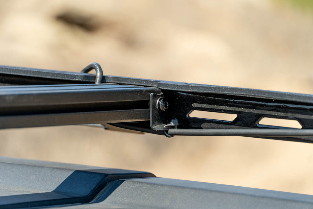 Installed Zip Tie Tabs to DV8 roof rack crossbar securing wiring