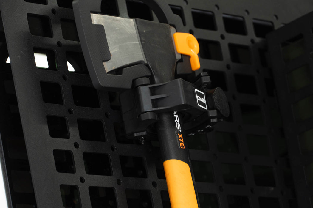 Universal Locking Tool Clamp installed with axe