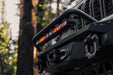 Low-angle view of installed Universal Spec Series Bull Bar with light bar