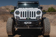 Xtract 9.5k lb Winch for use with synthetic winch lines installed on Jeep parked in the desert with aluminum hawse fairlead included