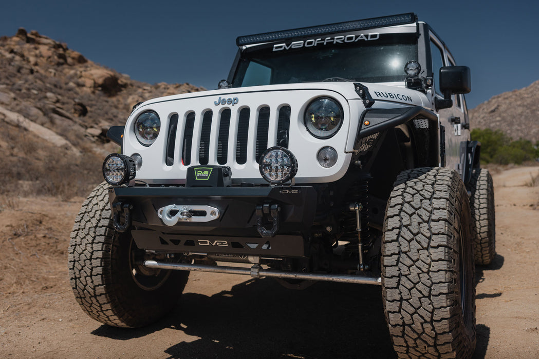 Front angled view of installed Xtract 9.5k Synthetic Rope Winch on DV8 jeep out in the desert 