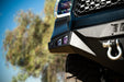 Zoomed in image showcasing two light pods mounted to the side wing of the Tundra winch front bumper.